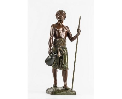 A cold painted French spelter figure of an Arab warrior, late 19th century, after Marcel Debut, in striding pose carrying a w