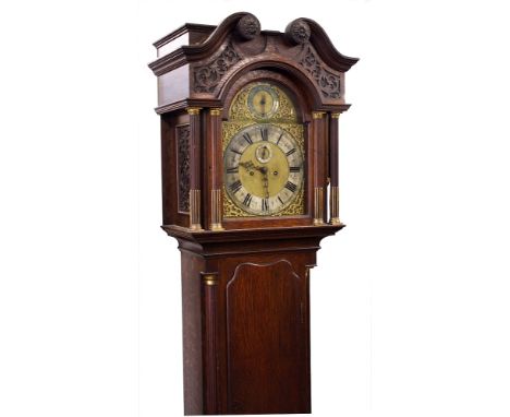 A late Victorian oak eight day longcase clock by Maple & Co., with twin train gong strike movement, the matted gilt brass arc