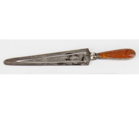 A novelty silver trowel form bookmark, Adie and Lovekin, Birmingham 1904, elongated form with stone set tapering handle, 4in.