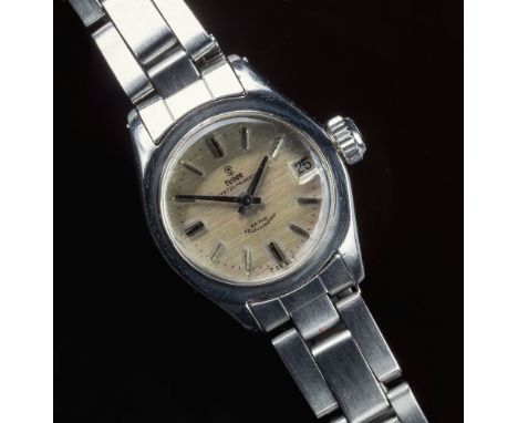 A ladies Tudor Oyster Princess date stainless steel wrist watch, rotor self winding, the signed 17mm. champagne dial with bat