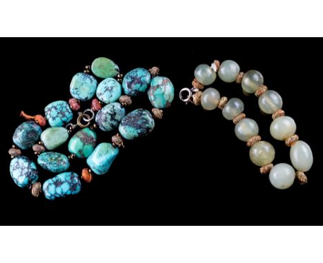 An Oriental turquoise and glass bead necklace, probably Tibetan, early 20th century, the fifteen naturalistic turquoise beads