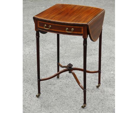 A small Edwardian mahogany Pembroke table, the satinwood banded dropflap oval top over a single satinwood banded bowfront dra