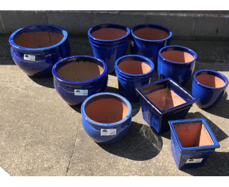 Three graduating glazed ceramic belly pots and seven other similar pots (10) Condition Report Click here for further images, 