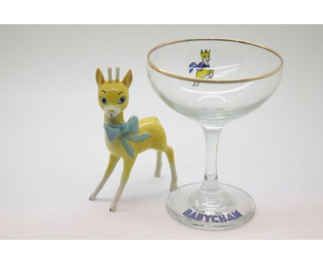 Beswick Babycham advertising model and glass. P&P Group 1 (£14+VAT for the first lot and £1+VAT for subsequent lots)Condition