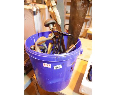 Bucket of tools to include saws and hand drills. This lot is not available for in-house P&amp;P, please contact the office fo