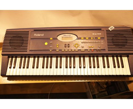 Roland EM-10 electronic keyboard (no power cable). P&amp;P Group 3 (£25+VAT for the first lot and £5+VAT for subsequent lots)