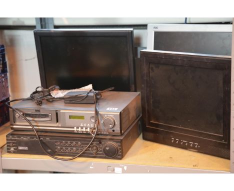 Shelf of mixed electronic equipment including three computer monitors. This lot is not available for in-house P&amp;P, please