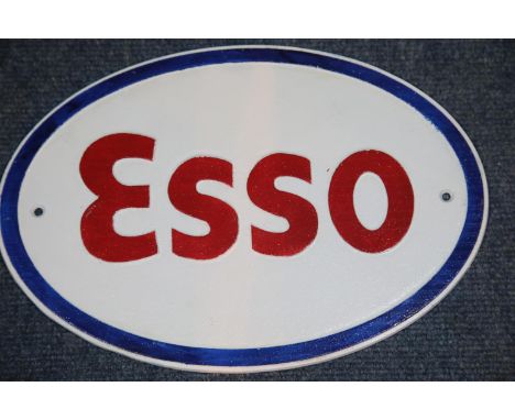 SOLD FOR THE NHS Cast iron Esso oval sign wall plaque, 33 x 23 cm. P&amp;P Group 2 (£18+VAT for the first lot and £2+VAT for 