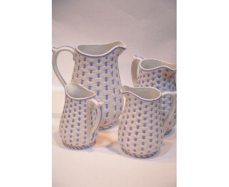 Set of four blue and white graduated basket weave effect jugs, tallest H: 23 cm. P&amp;P Group 3 (£25+VAT for the first lot a