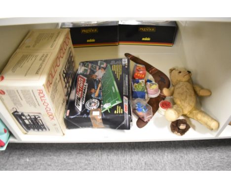 A shelf of mixed toys including mid 20th century straw filled Teddy Bear, height 40cm, Ideal Table Football, Mattel Roll-O Cl
