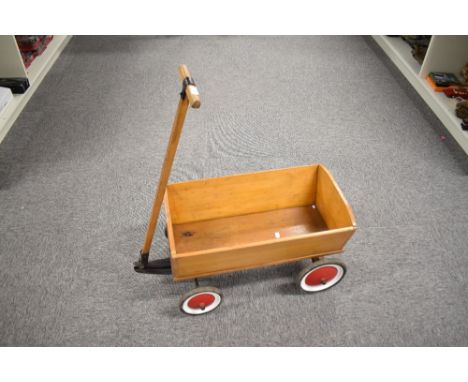 A Steiff 4838/20 Pull Along Articulated Wooden four wheel Truck, wood and metal handle, length 75cm