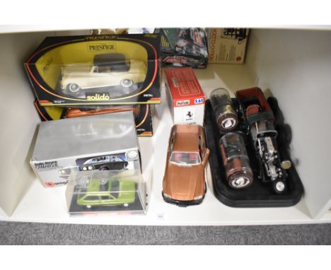 A shelf of mixed scale models, Solido Prestige 1:18 8006 Rolls Royce and 8007 Bentley, Burago 3001 Rolls Royce, Polistil 1:25