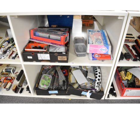Two shelves of Bachmann Underground Ernie Trains, Rolling Stock, Track and Accessories including Brooklyn, Circle and Victori