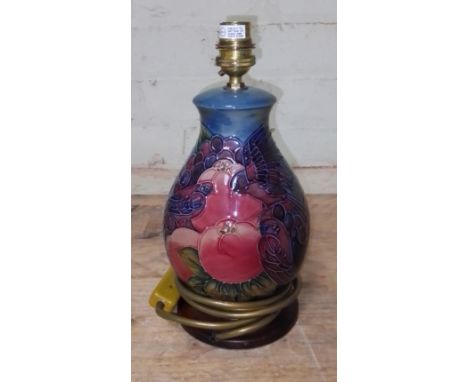 A Moorcroft pottery lamp base decorated in Finches pattern, height 27cm (excluding shade).