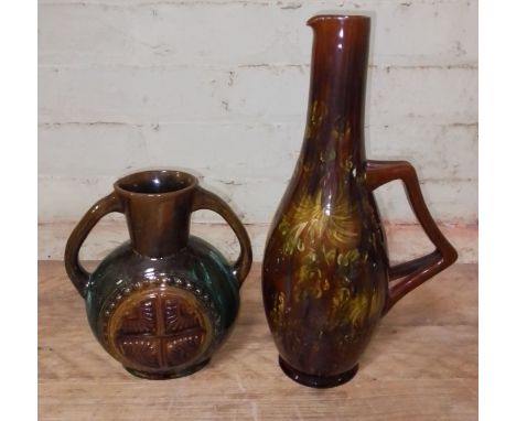 Two Linthorpe pottery jugs in the manner of Christopher Dresser, height19.5cm &amp; 34cm. Condition - each appears free from 