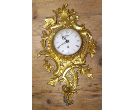 A Smiths gilt metal cartel clock, length 48cm.  