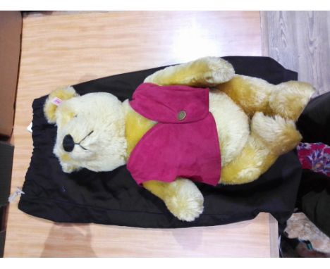 A Steiff Winnie the Pooh bear.