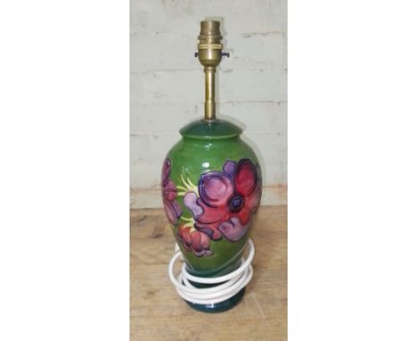 A Moorcroft pottery lamp base, height (including fitting) 39cm. Condition - no chips, cracks nor any sign of restoration, gen