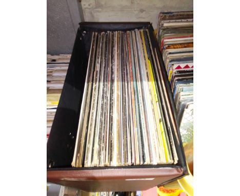 A case of LP records and 12" singles including Beatles, Who, Status Quo, Rolling Stones etc.  