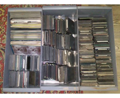 Three metal trays of stereoviews and magic lantern slides.  