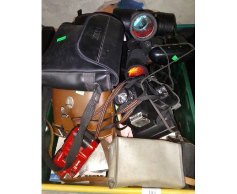 A box of assorted cameras including Polaroid, Halina, binoculars etc.  