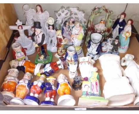 A box of assorted ornaments including a prattware, Staffordshire, toby condiments etc., etc.  