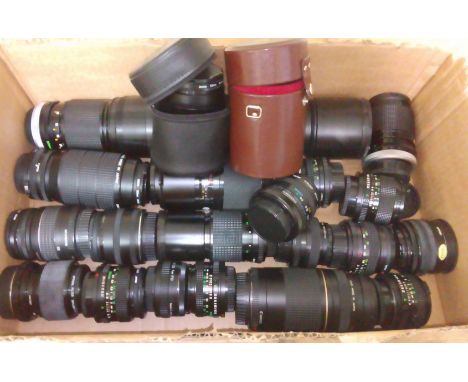 A box of assorted camera lenses including Carl Zeiss, Leitz, Canon, Minolta etc.  