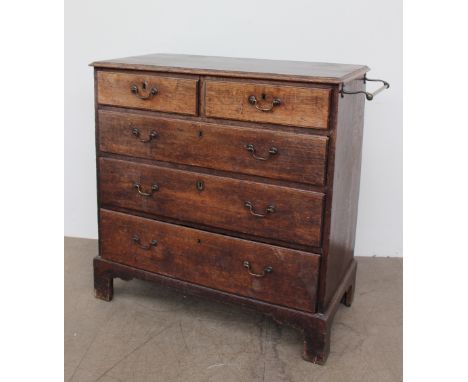 A 19th century oak chest, the rectangular moulded top above two short and three long drawers on bracket feet, 95cm wide x 47c