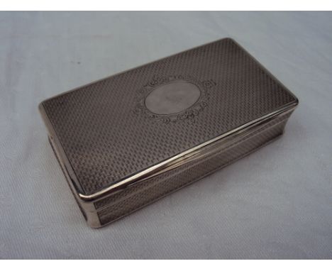 A French silver snuff box of rectangular form, with a central oval cartouche, 8.5cm wide, approximately 83 grams