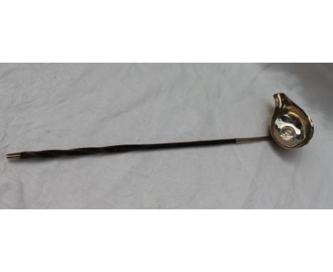 A George III silver toddy ladle, inset with a George II coin dated 1758, on a twisted horn handle, London, 1794   CONDITION R