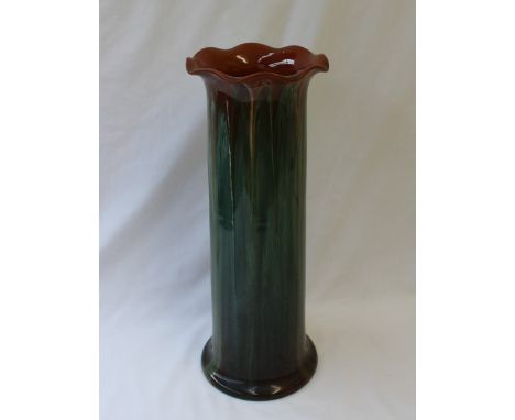 A Linthorpe pottery vase of cylindrical form with a flared rim and mottled green glaze, impressed No.2270, 35.5cm high 