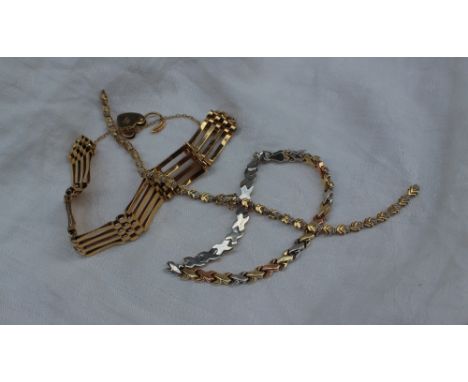 A 9ct yellow gold gate bracelet approximately 16.5 grams together with two other bracelets