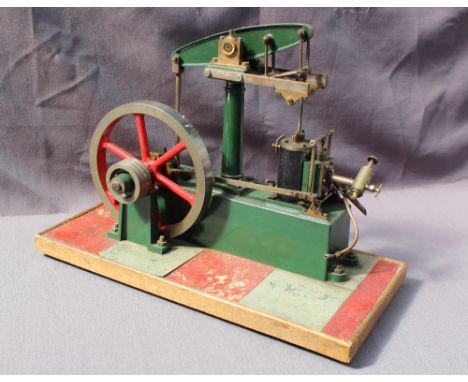 A Stuart live steam single cylinder beam engine, in green livery on a wooden base 29cm wide x 28cm high 
