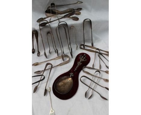 A late Victorian silver spoon, with a ship finial and twisted handle, Sheffield, 1900 together with a large quantity of silve