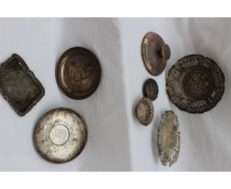 An Edward VII silver pin tray, cast with his portrait, Chester, 1901, together with another pin tray inset with a Churchill c