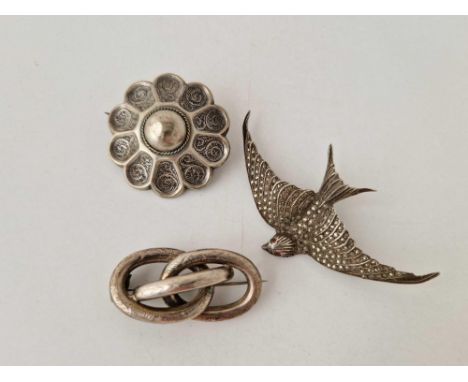 Three antique silver brooches 28 gms