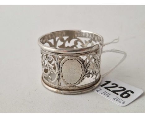 A decorative napkin ring with pierced decoration, Birmingham 1924