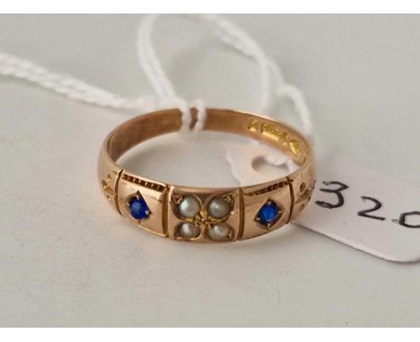 A Victorian ring set centrally with four pearls and a sapphire on each side 9ct Chester 1898 size T 2.6 gms