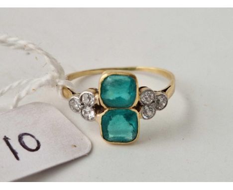 A HIGH CARAT TWO STONE EMERALD AND DIAMOND RING Q 2.3 GMS