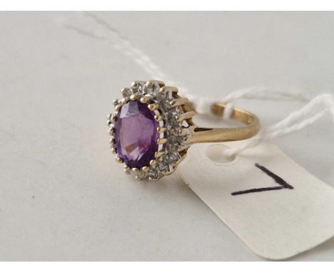 A antique diamond and amethyst cluster ring 9ct size L 2.2 gms