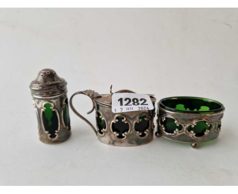 A three piece cruet set with pierced sides and green glass liners, Birmingham 1907, 73 g exc BGLS