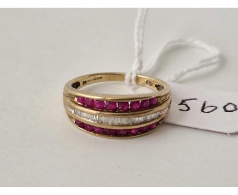 A three row ruby and baguette diamond ring 9ct size O 3 gms