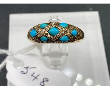 A ANTIQUE CARVED TURQUOISE AND DIAMOND RING WITH CRISS CROSS SETTING SET IN GOLD SIZE L 3.5 GMS