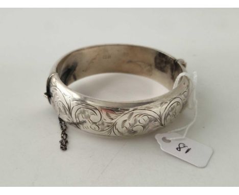 A hinged silver bangle 30 gms