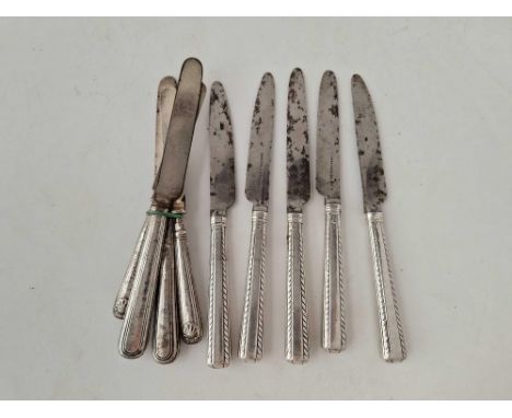 Five Georgian crested table knives by MB and four others