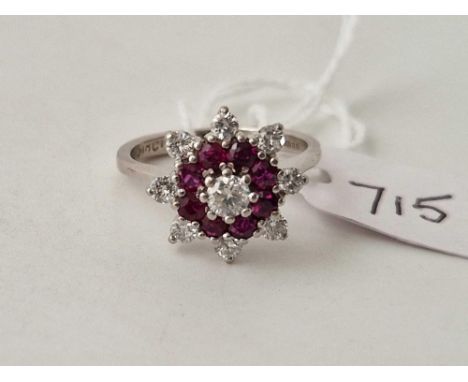 A WHITE GOLD DIAMOND AND RUBY CLUSTER RING 18CT GOLD SIZE M 4.6 GMS