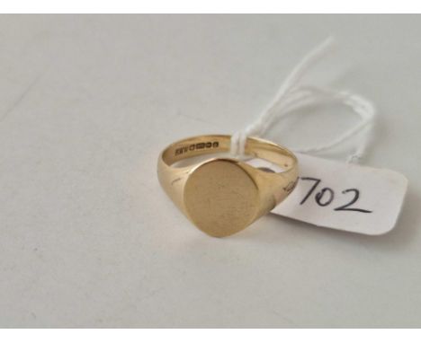 A plain signet ring  9ct size O