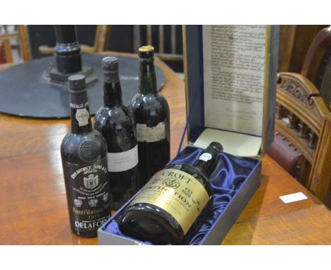 Port: Cockburn 1955, 75cl, lacking original label; Delaforce Sons & Co. Finest Vintage Port 1975, 75cl; Fonseca 1963 75cl; an