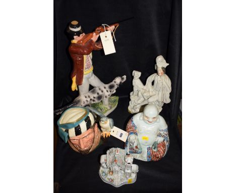 A Royal Doulton character jug 'ThenFalconer' D6533; a Staffordshire ornament modelled as a pastille burner house; a ceramic B