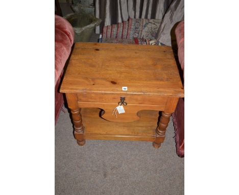 A modern stained pine rectangular two-tier occasional table, fitted a drawer and an undertier.